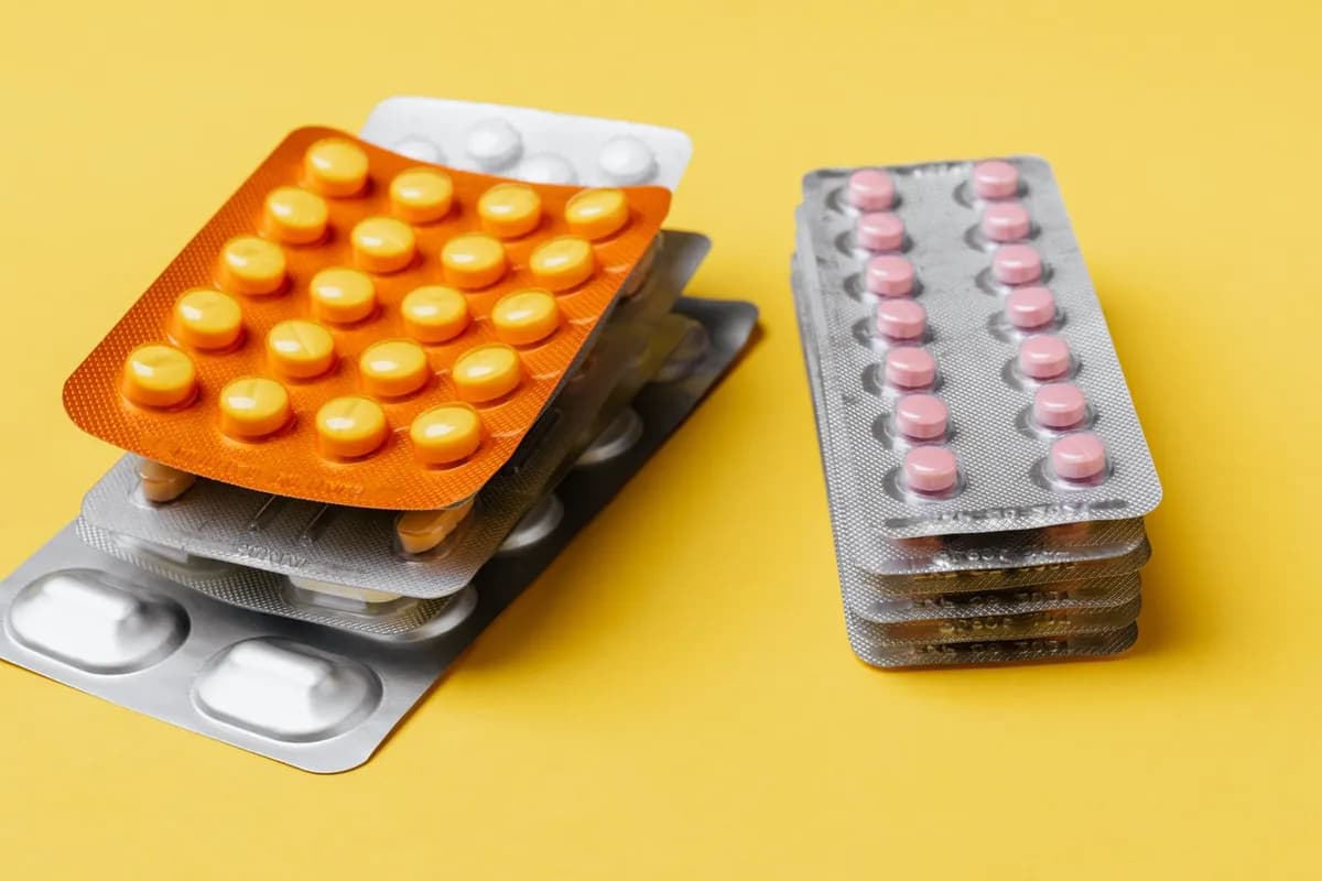 Assorted medication in blister packs — comparing oral and topical hair-loss treatment options in Malta